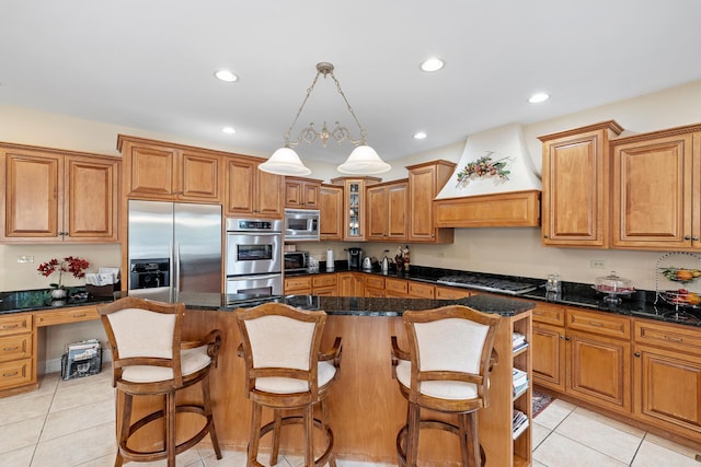 13738 Legend Trail Ln, Orland Park, IL 60462 - kitchen with built in appliances, brown cabinetry, light tile patterned flooring, a kitchen island, and recessed lighting