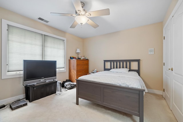 13738 Legend Trail Ln, Orland Park, IL 60462 - carpeted bedroom with baseboards, ceiling fan, and a closet