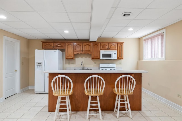 13738 Legend Trail Ln, Orland Park, IL 60462 - kitchen featuring white appliances, a sink, baseboards, light countertops, and recessed lighting
