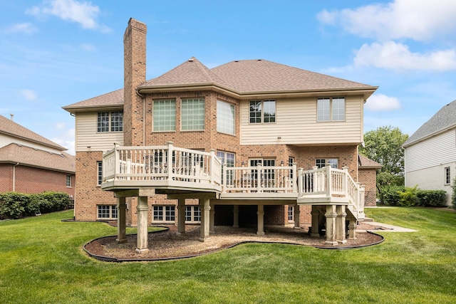 13738 Legend Trail Ln, Orland Park, IL 60462 - back of house with brick siding, a wooden deck, a chimney, and a lawn