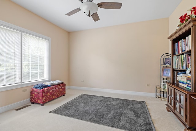 13738 Legend Trail Ln, Orland Park, IL 60462 - living area featuring light carpet, a ceiling fan, and baseboards