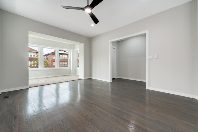 7925 S May St, Chicago, IL 60620 - unfurnished room featuring dark wood finished floors, a ceiling fan, and baseboards