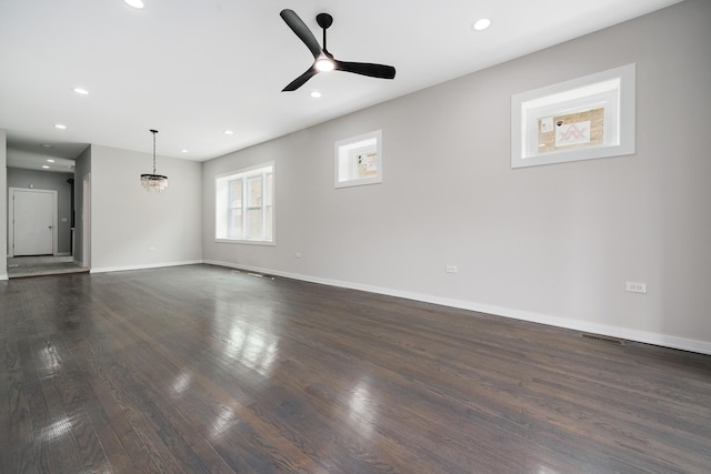 7925 S May St, Chicago, IL 60620 - unfurnished room featuring dark wood finished floors, recessed lighting, a ceiling fan, and baseboards
