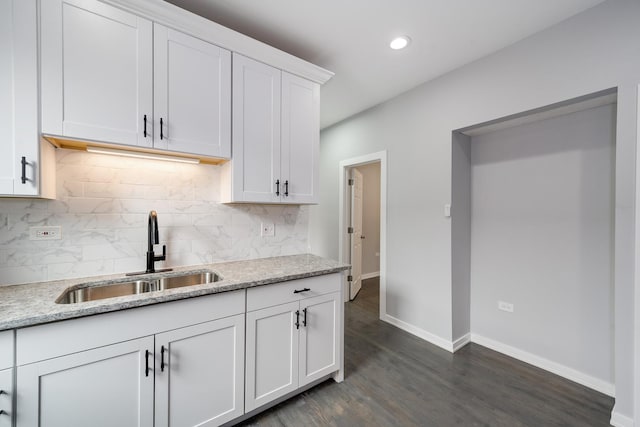 7925 S May St, Chicago, IL 60620 - kitchen with a sink, dark wood-style flooring, decorative backsplash, recessed lighting, and baseboards