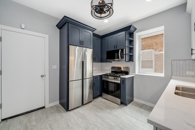 7925 S May St, Chicago, IL 60620 - kitchen featuring stainless steel appliances, light stone counters, backsplash, open shelves, and recessed lighting