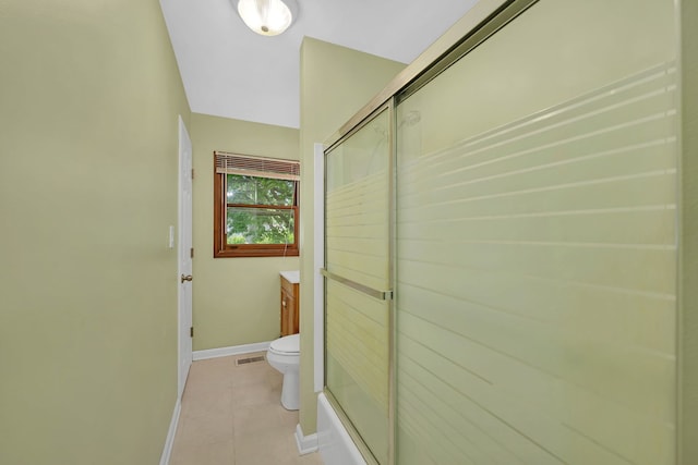 402 Kenyon Ave, Romeoville, IL 60446 - full bathroom with baseboards, vanity, tile patterned flooring, and toilet