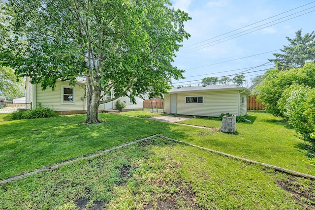 402 Kenyon Ave, Romeoville, IL 60446 - view of yard featuring an outbuilding