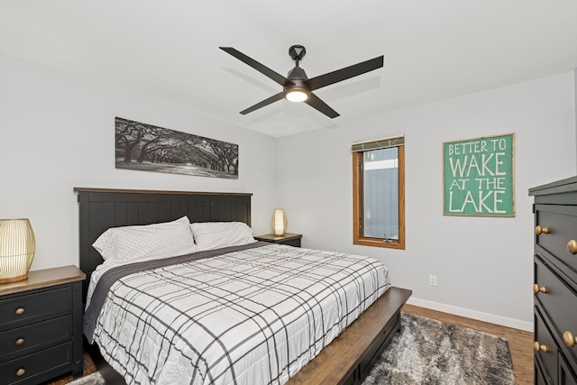 610 Mchenry Ave, Mchenry, IL 60050 - bedroom with baseboards, wood finished floors, and ceiling fan