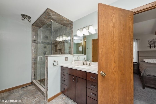 610 Mchenry Ave, Mchenry, IL 60050 - full bath featuring ensuite bath, vanity, a stall shower, and baseboards