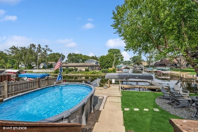 610 Mchenry Ave, Mchenry, IL 60050 - view of pool featuring a dock, boat lift, and a water view