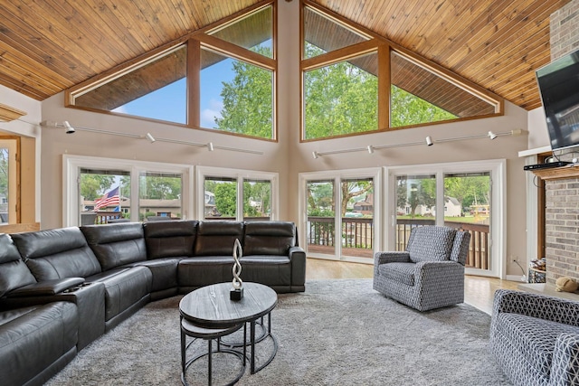 610 Mchenry Ave, Mchenry, IL 60050 - living area featuring high vaulted ceiling, wooden ceiling, and a brick fireplace