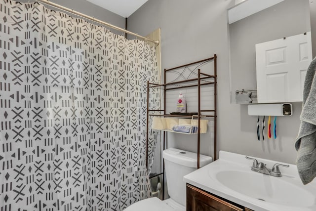 1313 W Cornelia Ave, Waukegan, IL 60085 - bathroom with toilet, a shower with curtain, and vanity