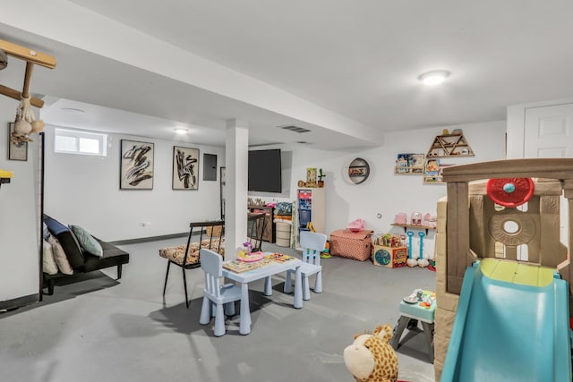 1313 W Cornelia Ave, Waukegan, IL 60085 - playroom featuring finished concrete floors
