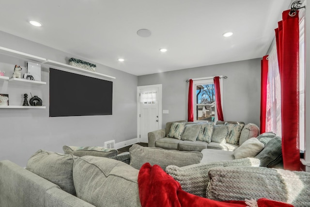 1313 W Cornelia Ave, Waukegan, IL 60085 - living room featuring recessed lighting and baseboards