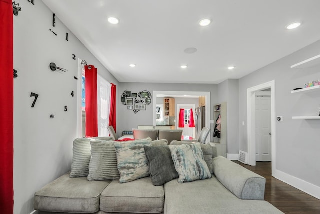 1313 W Cornelia Ave, Waukegan, IL 60085 - living area featuring dark wood finished floors, recessed lighting, and baseboards