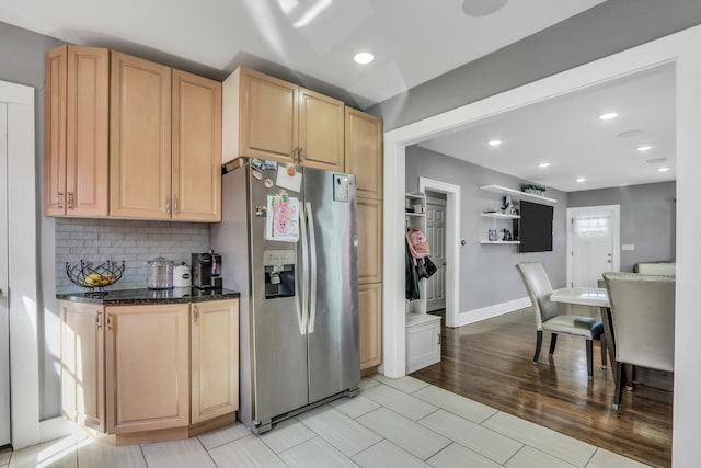 1313 W Cornelia Ave, Waukegan, IL 60085 - kitchen with stainless steel fridge with ice dispenser, light brown cabinetry, tasteful backsplash, dark stone counters, and recessed lighting
