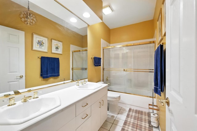 170 Manchester Dr Unit 406, Buffalo Grove, IL 60089 - bathroom featuring double vanity, tile patterned flooring, and shower / bath combination with glass door
