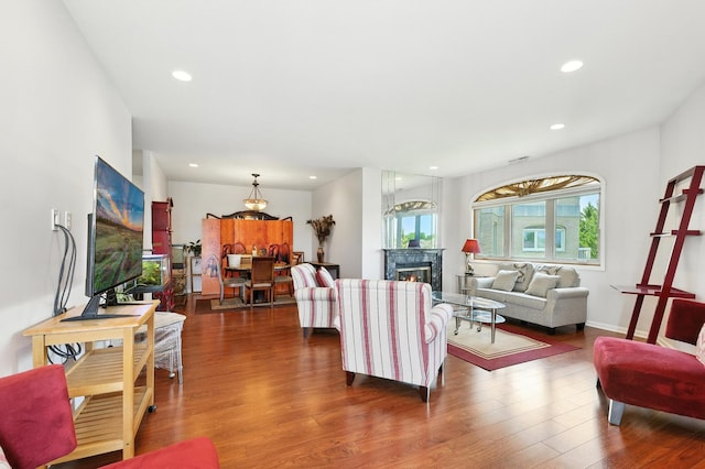 170 Manchester Dr Unit 406, Buffalo Grove, IL 60089 - living room with wood finished floors, recessed lighting, a premium fireplace, and a chandelier