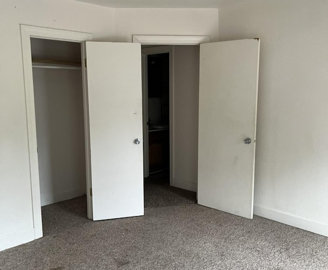 110-112 E Frank St, Freeport, IL 61032 - unfurnished bedroom with carpet floors and baseboards
