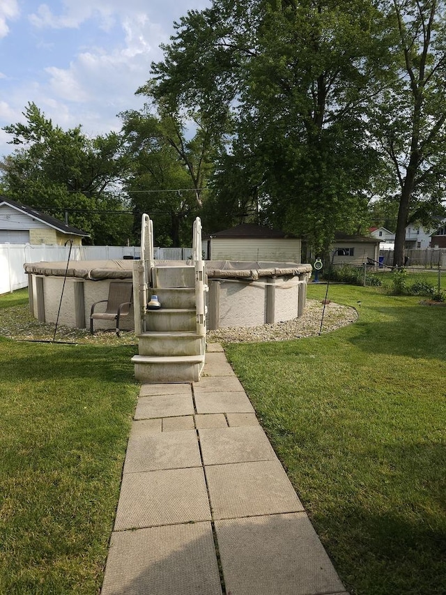 46 E 155th St, Harvey, IL 60426 - view of yard featuring a covered pool