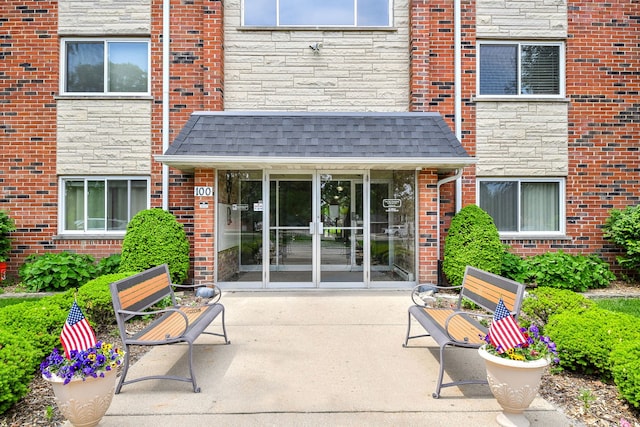 100 W Park Cir Unit 1E, Wheaton, IL 60187 - entrance to property featuring stone siding and brick siding