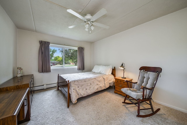 100 W Park Cir Unit 1E, Wheaton, IL 60187 - bedroom featuring carpet flooring, baseboard heating, ceiling fan, and baseboards