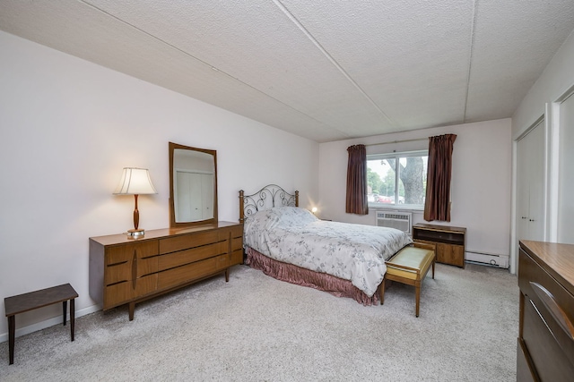100 W Park Cir Unit 1E, Wheaton, IL 60187 - bedroom featuring a baseboard radiator, light colored carpet, and a textured ceiling