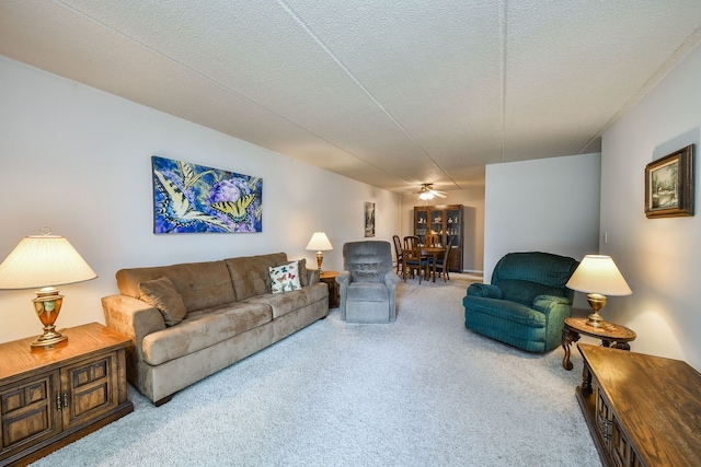 100 W Park Cir Unit 1E, Wheaton, IL 60187 - carpeted living area with a ceiling fan and a textured ceiling