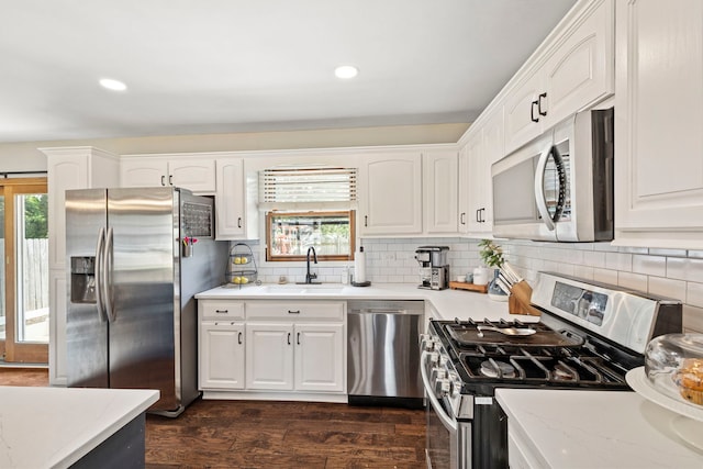 5907 W 124th St, Alsip, IL 60803 - kitchen with stainless steel appliances, plenty of natural light, dark wood-style floors, white cabinetry, and recessed lighting