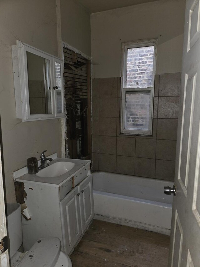 11745 S Union Ave, Chicago, IL 60628 - bathroom featuring toilet, vanity, and wood finished floors