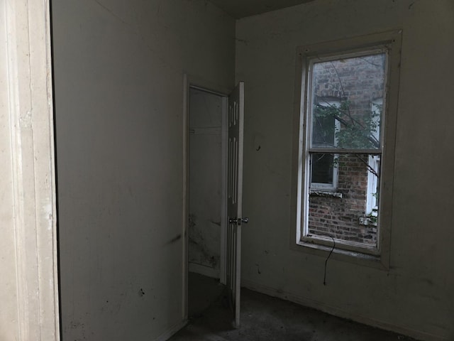11745 S Union Ave, Chicago, IL 60628 - unfurnished bedroom featuring concrete flooring