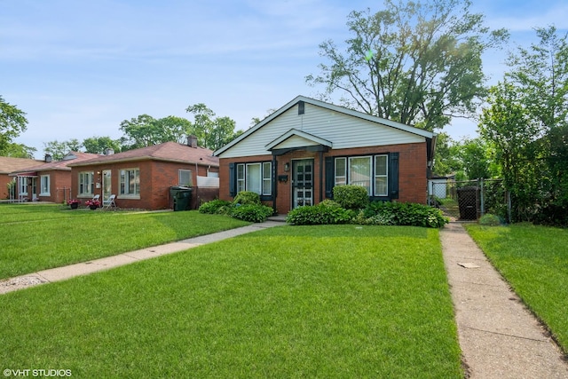 14841 Langley Ave, Dolton, IL 60419 - view of front of home with brick siding and a gate