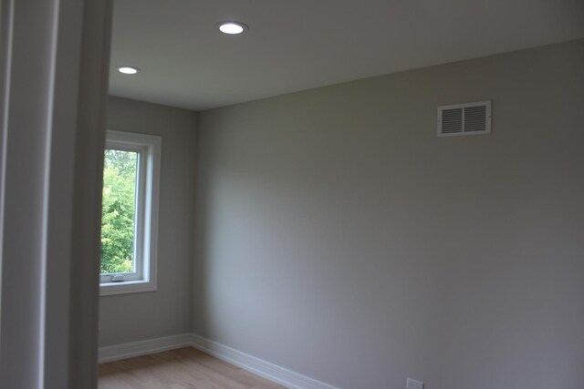 5660 W 83rd Pl, Burbank, IL 60459 - spare room with plenty of natural light, light wood finished floors, baseboards, and recessed lighting