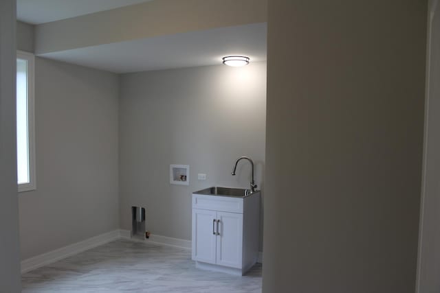 5660 W 83rd Pl, Burbank, IL 60459 - laundry area with washer hookup, light marble finish flooring, cabinet space, and baseboards