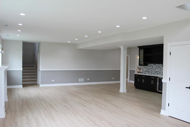 5660 W 83rd Pl, Burbank, IL 60459 - unfurnished living room with light wood-style floors, recessed lighting, stairs, and baseboards