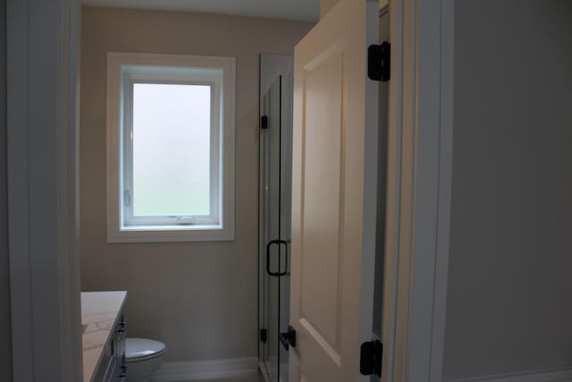 5660 W 83rd Pl, Burbank, IL 60459 - bathroom with vanity, a stall shower, toilet, and baseboards