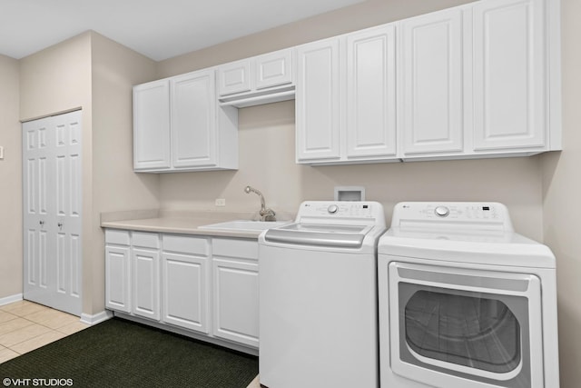 65 S Asbury Ct, Lake Forest, IL 60045 - laundry area with washer and clothes dryer, light tile patterned floors, and cabinet space