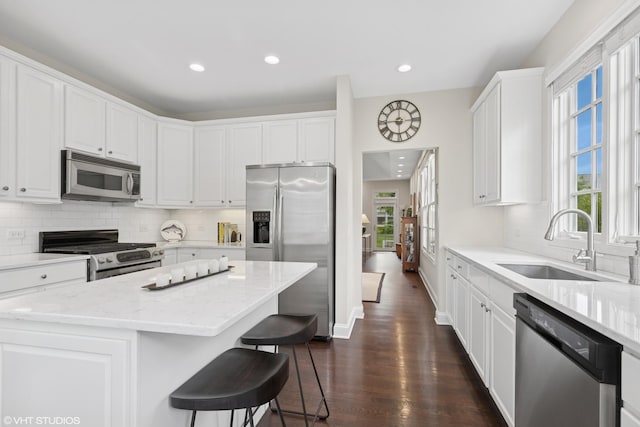65 S Asbury Ct, Lake Forest, IL 60045 - kitchen with appliances with stainless steel finishes, plenty of natural light, recessed lighting, and white cabinetry
