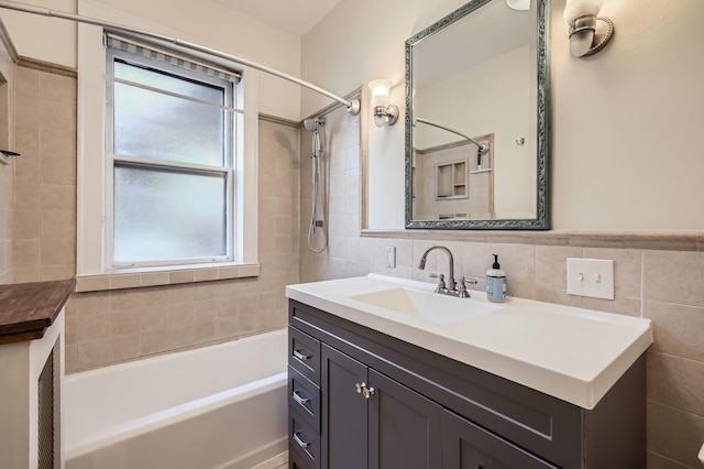 1038 Washington Blvd Unit 1, Oak Park, IL 60302 - bathroom with vanity, tile walls, and washtub / shower combination