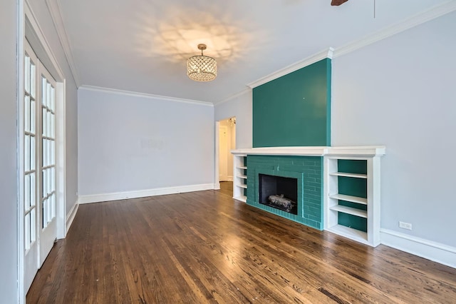 1038 Washington Blvd Unit 1, Oak Park, IL 60302 - unfurnished living room with baseboards, a brick fireplace, wood finished floors, crown molding, and a ceiling fan
