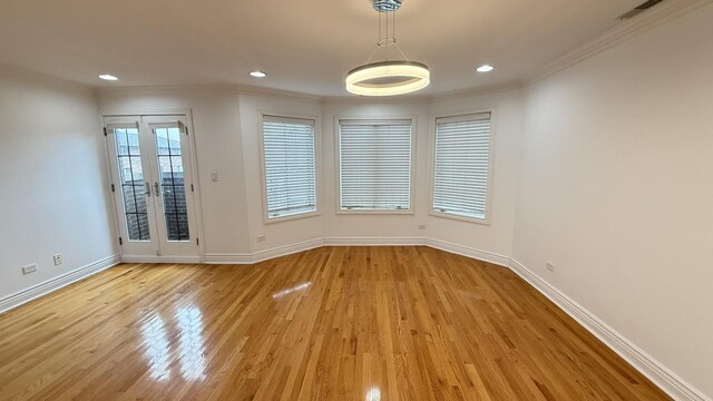 3004 S Canal St, Chicago, IL 60616 - spare room with light wood-style floors, crown molding, baseboards, and recessed lighting