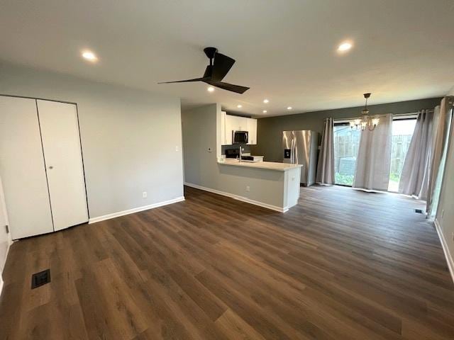 211 W Birchwood Dr Unit 211, Romeoville, IL 60446 - unfurnished living room with baseboards, a chandelier, recessed lighting, dark wood-style flooring, and a ceiling fan