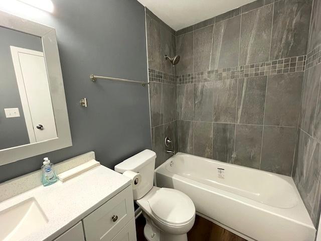 211 W Birchwood Dr Unit 211, Romeoville, IL 60446 - full bathroom featuring vanity, toilet, and bathtub / shower combination