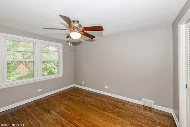 226 S Maple Ave Unit F, Oak Park, IL 60302 - spare room with a ceiling fan and dark wood-style floors