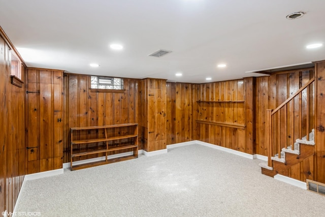 226 S Maple Ave Unit F, Oak Park, IL 60302 - basement featuring carpet floors, wood walls, stairs, and recessed lighting