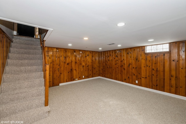 226 S Maple Ave Unit F, Oak Park, IL 60302 - below grade area with wood walls, stairs, carpet, and recessed lighting