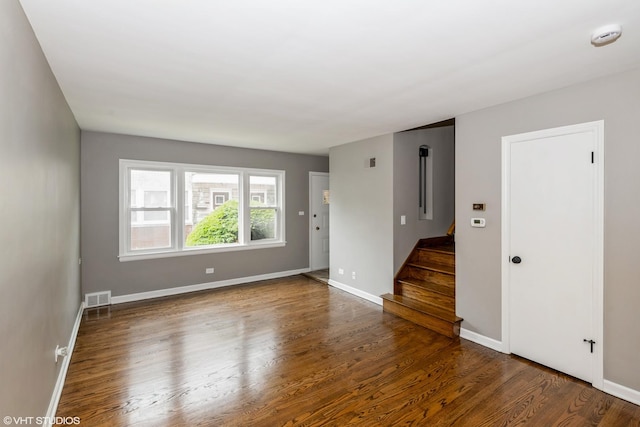 226 S Maple Ave Unit F, Oak Park, IL 60302 - empty room with stairway, wood finished floors, and a smoke detector