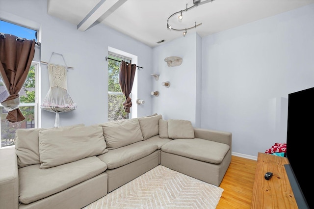 2744 W Haddon Ave Unit 2, Chicago, IL 60622 - living room featuring wood finished floors, baseboards, and beam ceiling