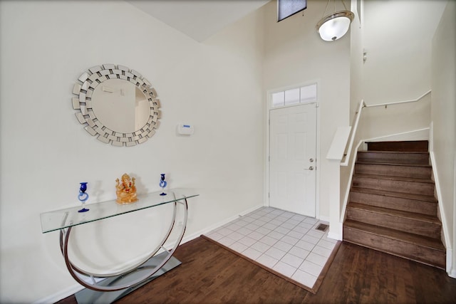 439 Bay Tree Cir, Vernon Hills, IL 60061 - entryway featuring wood finished floors, stairs, baseboards, and a high ceiling
