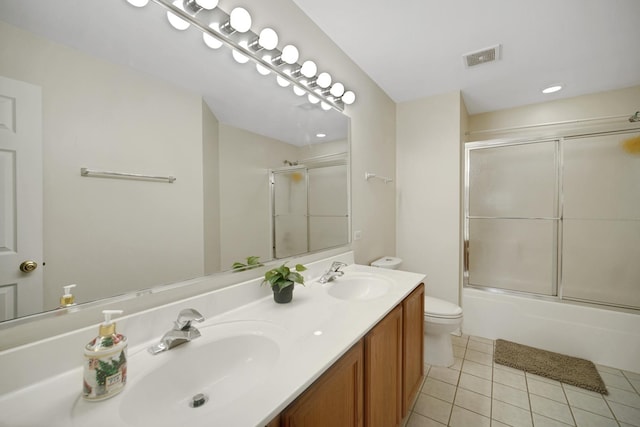 439 Bay Tree Cir, Vernon Hills, IL 60061 - full bath with toilet, tile patterned floors, double vanity, shower / bath combination with glass door, and recessed lighting